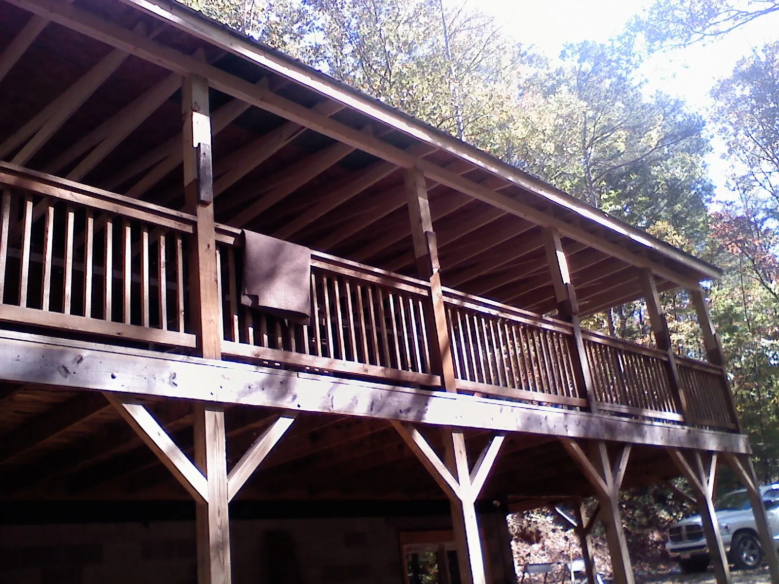 Timber framing under a new elevated porch and deck — Roof Leak Repair in Algonquin by Roofing Brothers